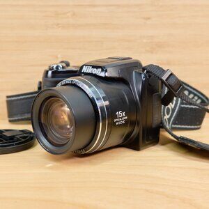 Nikon Coolpix L110 12 MP Digital Camera 15x Optical Zoom, with Case